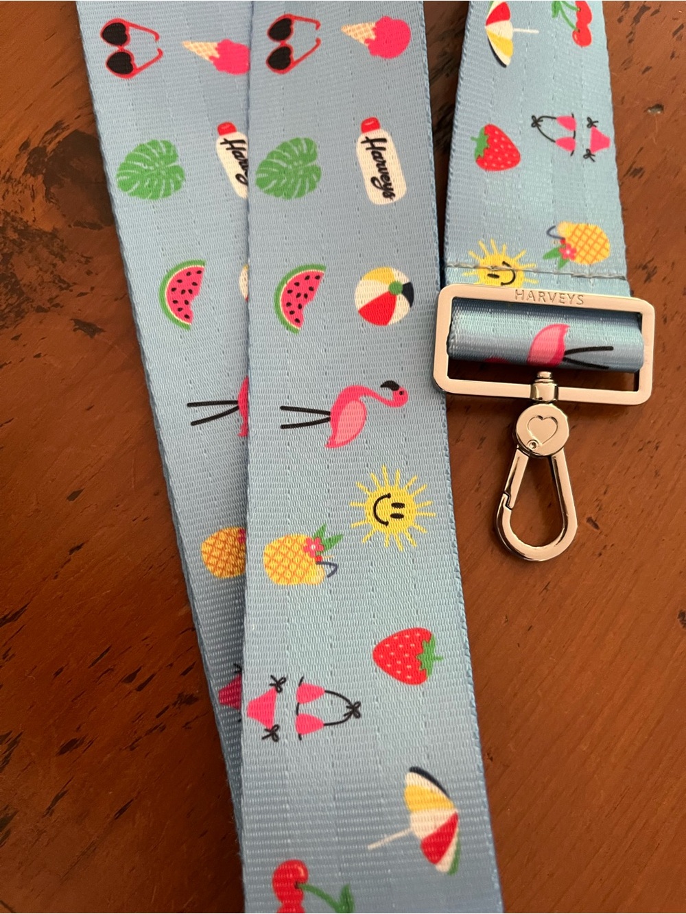 Harveys Click n’ Carry Seatbelt Crossbody Strap - Light Blue w/Summer Icons